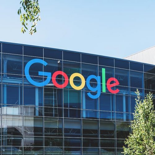Google-Hero-500×500 Glass fronted office building with "Google" logo on the front.
